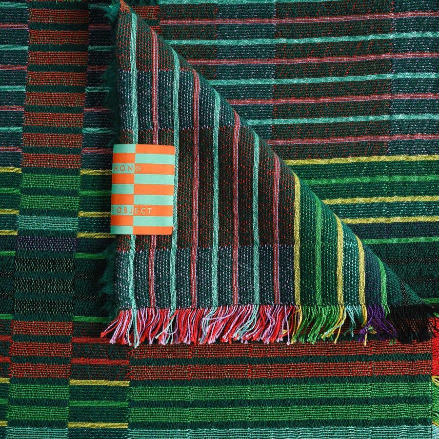 Estuary Wool Woven Blanket in Grass